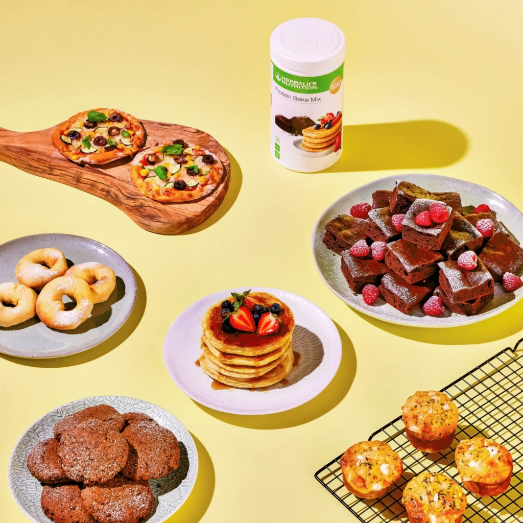 decorative image of Herbalife nutritions protein bake mix with baked goods